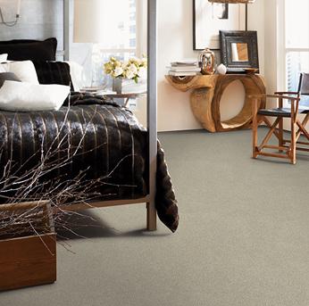Bedroom scene with green Alexander Smith carpet